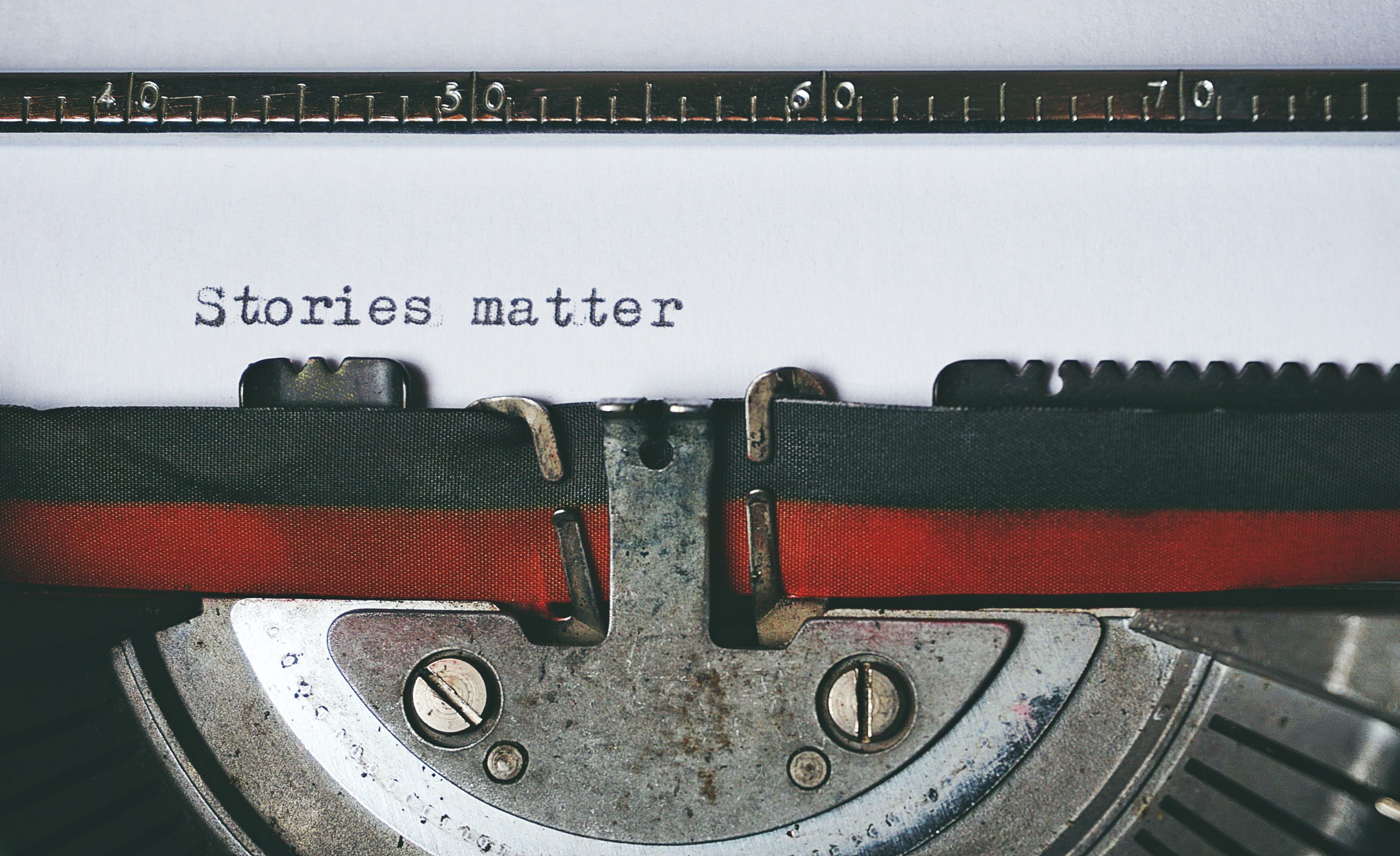 'Stories matter' text on a typewriter